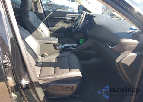 2023 Buick Envision Essence Fwd z USA, uszkodzony, nr VIN LRBFZNR47PD126831